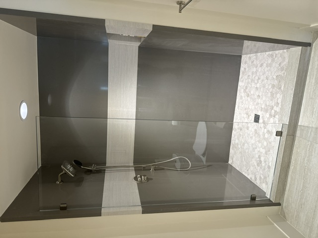 Custom bathroom vanity mirror installation