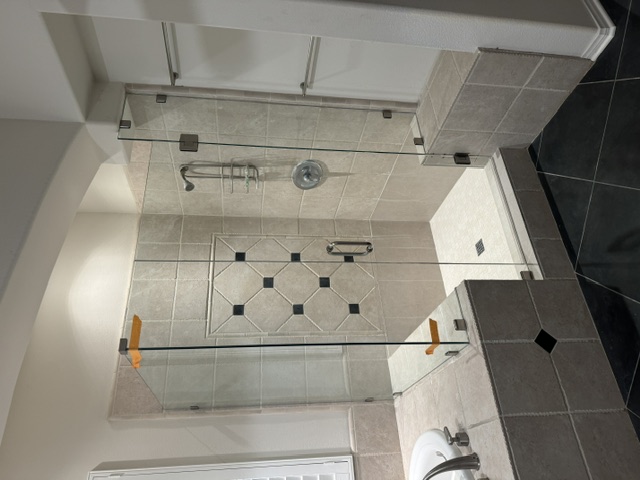 Custom frameless glass shower door installation in Palm Desert